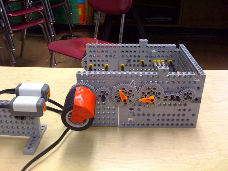 Gears Determining Angular Velocity Activity A Photograph Shows Contraption Made Of Lego Parts Two Light Sensors Are Focused On